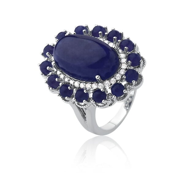 ANEL OVAL BANHADO A RÓDIO COM CABOCHÕES NA COR SAFIRA E ZIRCÔNIAS BRANCAS